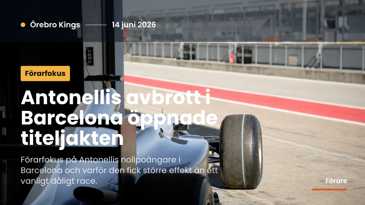 Generisk silverfärgad formelbil i garage efter ett avbrutet race.